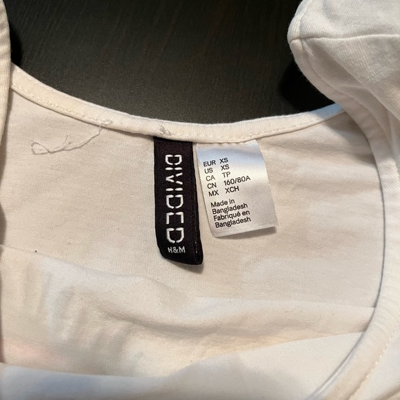 White Long Sleeve Scoop Neck Shirt with Eyelashes and Low Back, Size XS - Picture 3 of 4